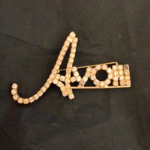 Avon Rhinestone Brooch Pin Logo Representative Gold Tone Flourish